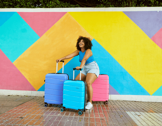 מזוודה צבעונית אמריקן טוריסטר